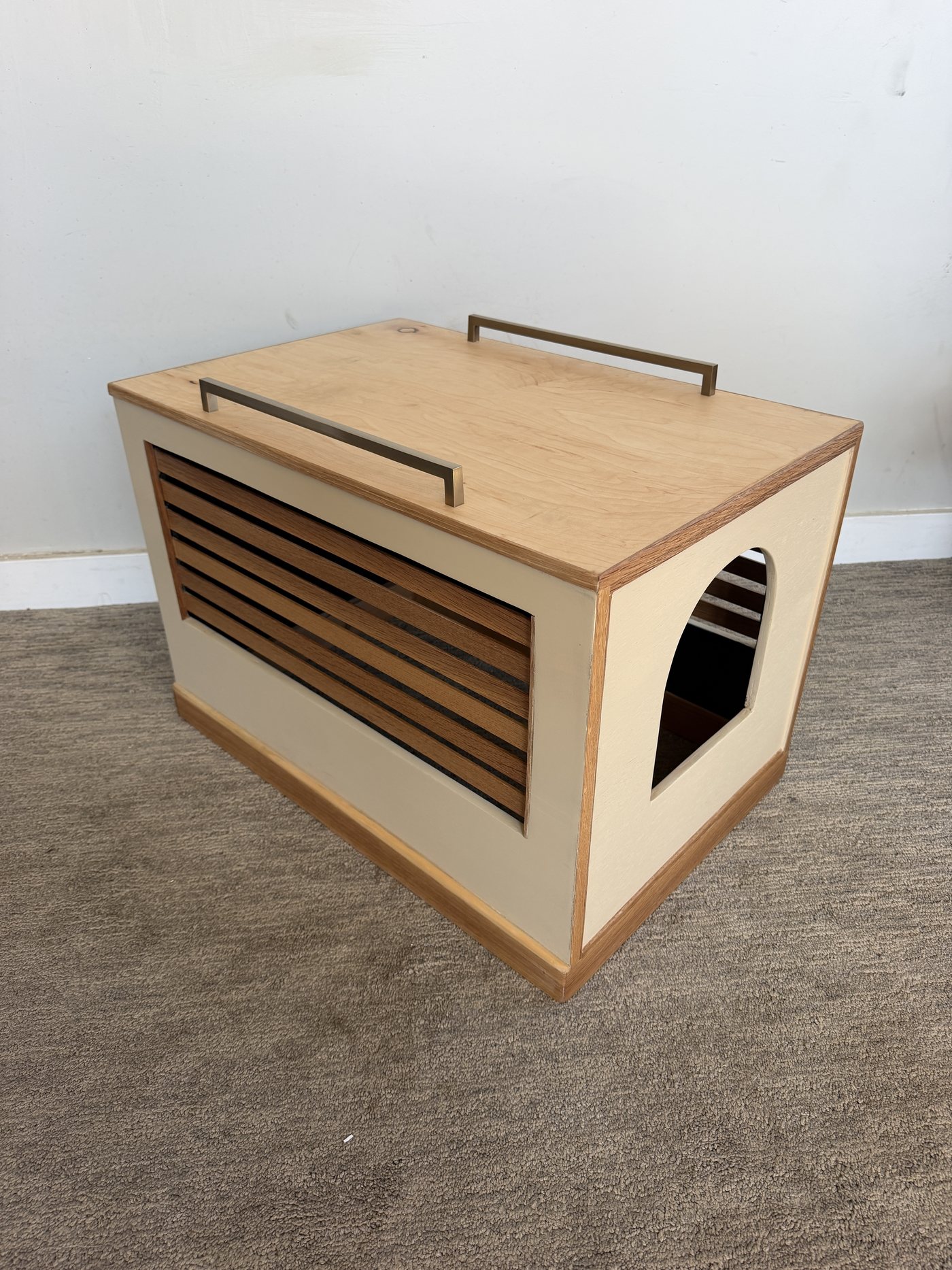 Finished cat box enclosure: panels sprayed in Sande, white oak frame and slats, oak top