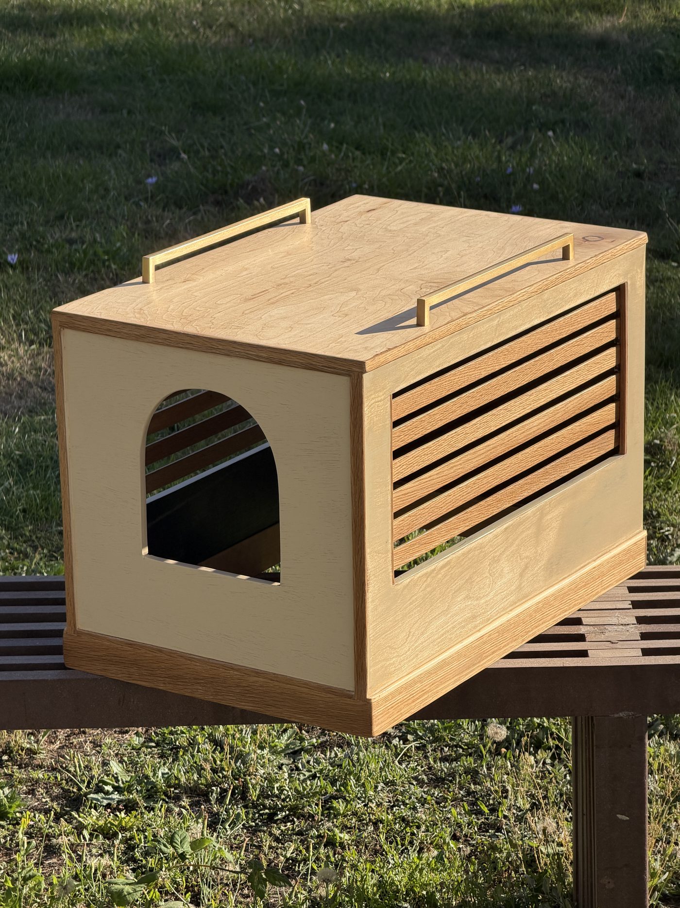 Enclosure on a slatted bench outdoors